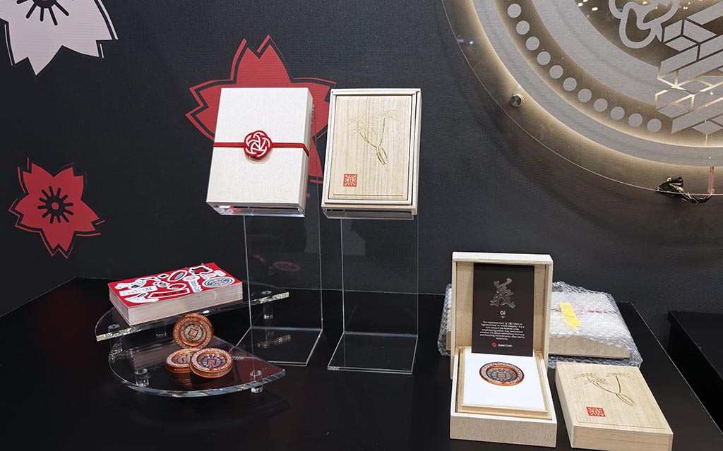 Retailer selling Satori Coin at the counter